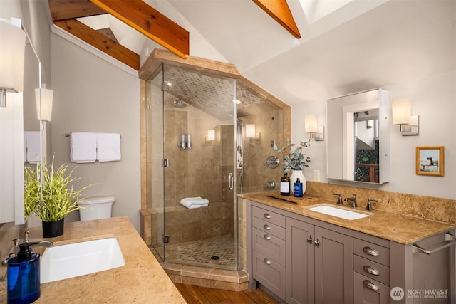 1237 Hawley Way NE, Bainbridge Island, WA 98110 - bathroom with two vanities, a shower stall, and wood finished floors