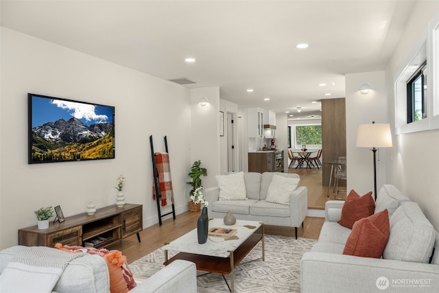 7201 Seward Park Ave S, Seattle, WA 98118 - living room featuring light wood-style floors, recessed lighting, and baseboards