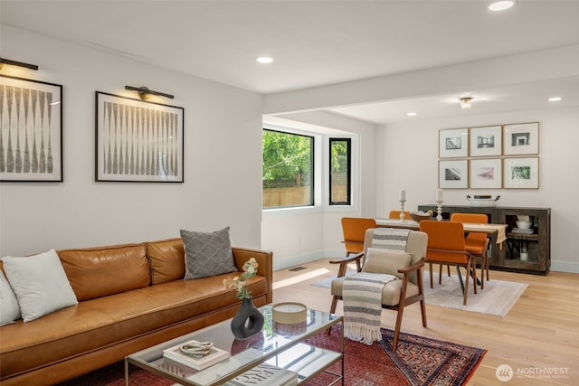 7201 Seward Park Ave S, Seattle, WA 98118 - living room with recessed lighting, light wood-type flooring, and baseboards