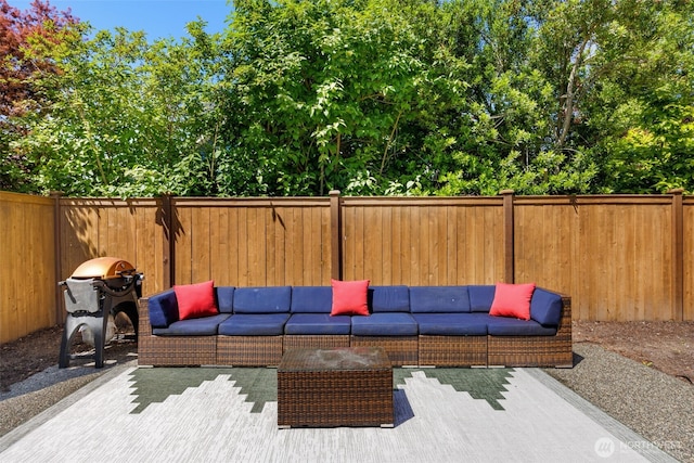 7201 Seward Park Ave S, Seattle, WA 98118 - fenced backyard featuring outdoor lounge area and a grill