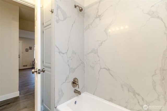 2914 S 17th St, Tacoma, WA 98405 - bathroom featuring bathtub / shower combination, wood finished floors, and baseboards