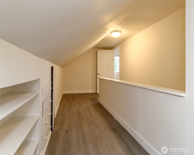 2914 S 17th St, Tacoma, WA 98405 - hall featuring vaulted ceiling, wood finished floors, and baseboards