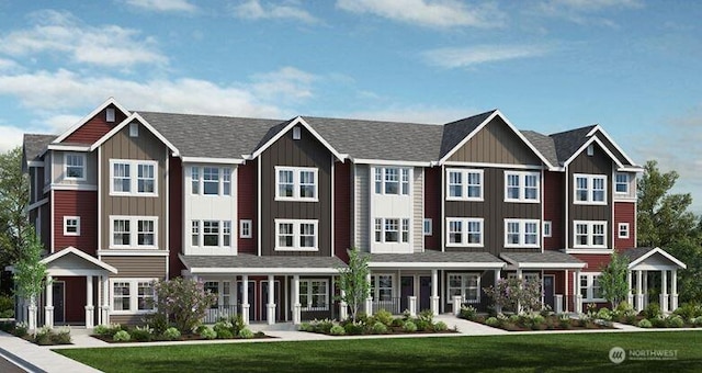 19226 NE 69th Cir Unit 106, Redmond, WA 98052 - view of front facade featuring board and batten siding and a front yard