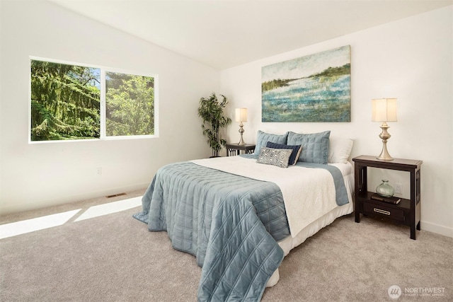 303 NE 133rd St, Seattle, WA 98125 - bedroom featuring light colored carpet and baseboards