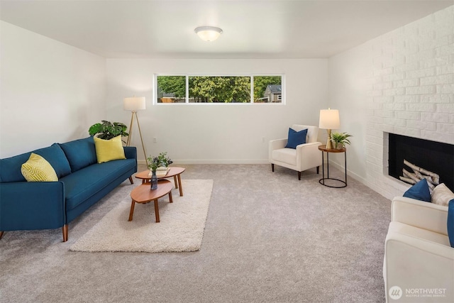 303 NE 133rd St, Seattle, WA 98125 - carpeted living area with a brick fireplace and baseboards