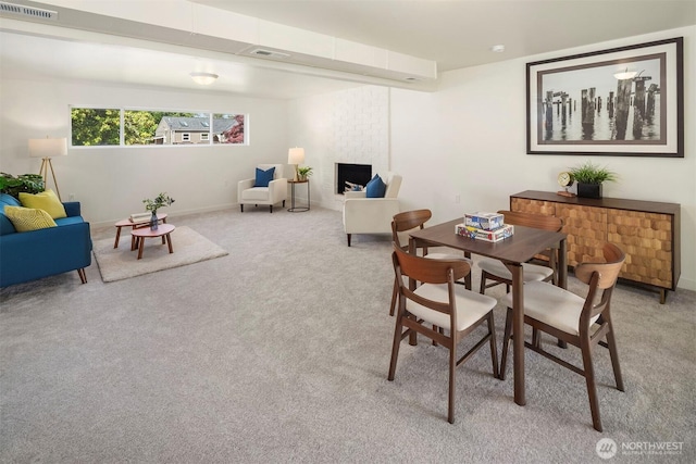 303 NE 133rd St, Seattle, WA 98125 - dining room with light colored carpet and baseboards