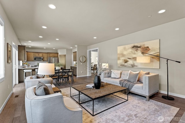 1794 Granite Way SE, North Bend, WA 98045 - living area with recessed lighting, wood finished floors, and baseboards