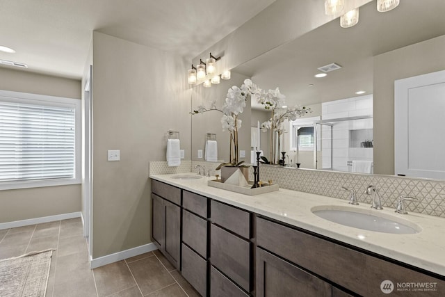 1794 Granite Way SE, North Bend, WA 98045 - bathroom featuring tile patterned flooring, double vanity, backsplash, and a shower stall