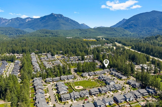 1794 Granite Way SE, North Bend, WA 98045 - aerial perspective of suburban area with a forest and a mountain backdrop