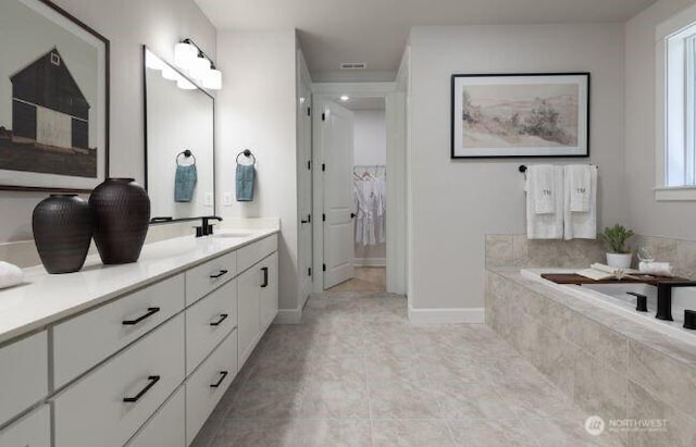 2627 Acer Loop SE, Lacey, WA 98513 - bathroom featuring double vanity, a bath, and tile patterned flooring