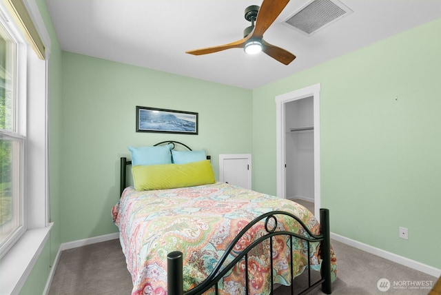 5675 E Hillcrest Dr, Port Orchard, WA 98366 - bedroom with carpet floors, multiple windows, and baseboards