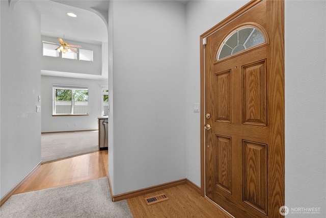 509 Clover Ln, Bellingham, WA 98226 - foyer entrance with wood finished floors, ceiling fan, baseboards, and carpet flooring
