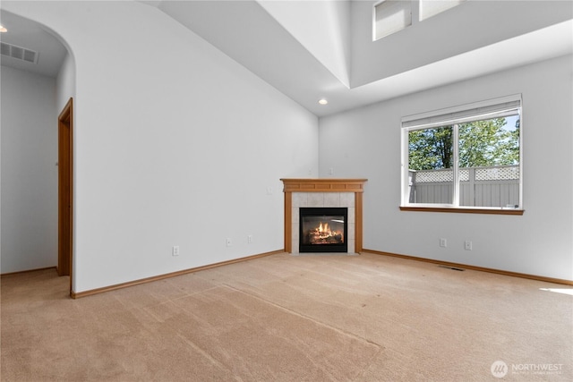 509 Clover Ln, Bellingham, WA 98226 - unfurnished living room with carpet, high vaulted ceiling, a fireplace, recessed lighting, and baseboards