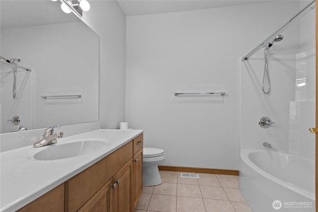 509 Clover Ln, Bellingham, WA 98226 - full bath featuring vanity, toilet, shower / washtub combination, baseboards, and tile patterned flooring