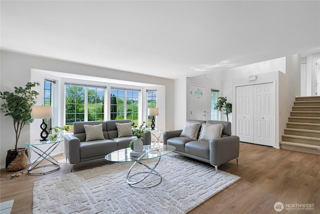 7718 NE 183rd St, Kenmore, WA 98028 - living room with wood finished floors and stairway