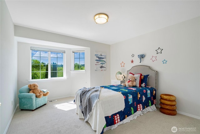 7718 NE 183rd St, Kenmore, WA 98028 - carpeted bedroom featuring baseboards