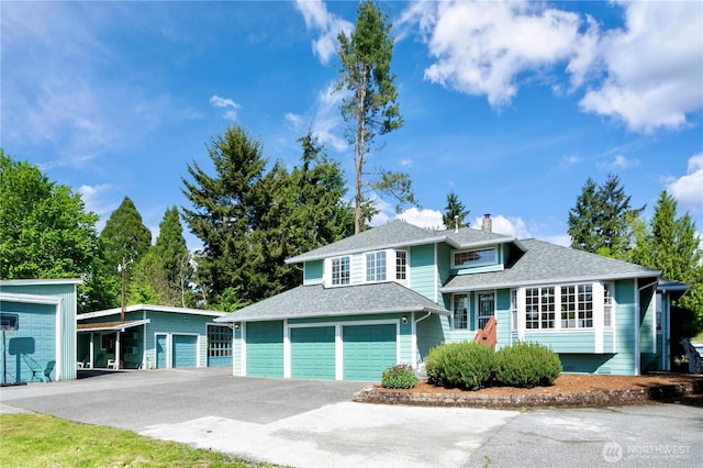 7718 NE 183rd St, Kenmore, WA 98028 - split level home with a chimney, driveway, and roof with shingles