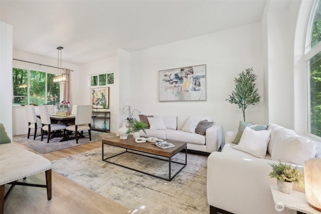 27716 NE 30th St, Redmond, WA 98053 - living room with wood finished floors and a chandelier