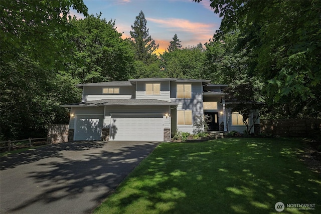 27716 NE 30th St, Redmond, WA 98053 - prairie-style house with asphalt driveway, an attached garage, and stone siding