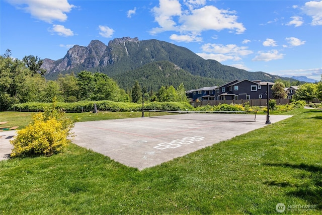 303 Vaughan Blvd NE, North Bend, WA 98045 - view of community featuring a tennis court, a mountain view, and uncovered parking