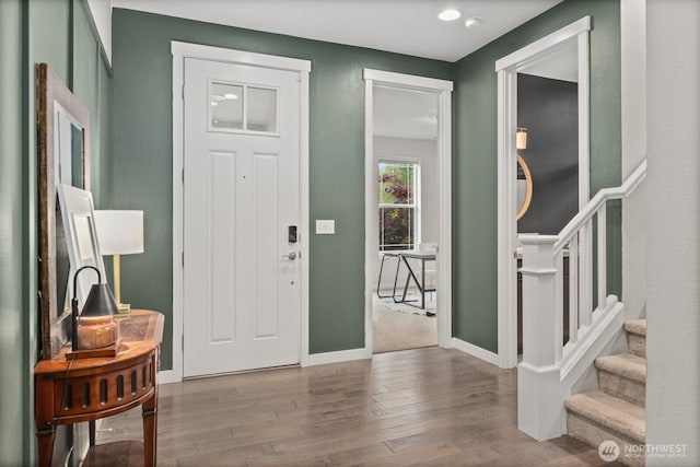 303 Vaughan Blvd NE, North Bend, WA 98045 - foyer entrance featuring wood finished floors, baseboards, and stairs