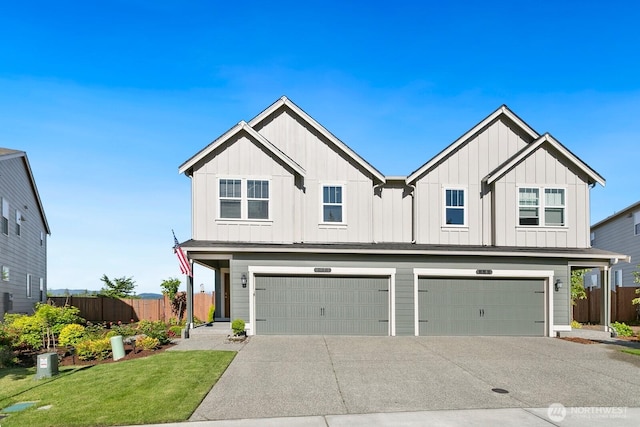 6451 Randolph Dr NE, Bremerton, WA 98311 - view of front of home featuring a garage, board and batten siding, and concrete driveway