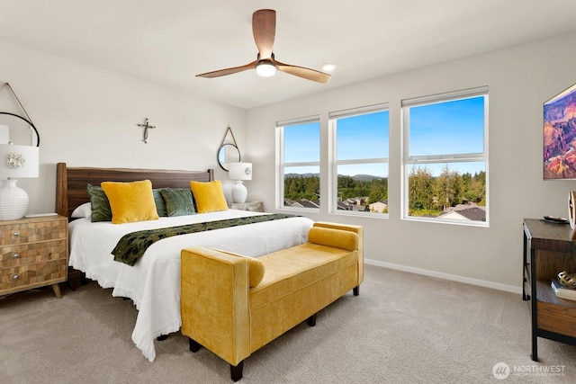 6451 Randolph Dr NE, Bremerton, WA 98311 - bedroom featuring light colored carpet, baseboards, and a ceiling fan