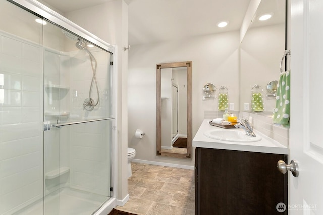 6451 Randolph Dr NE, Bremerton, WA 98311 - full bath with toilet, vanity, a stall shower, baseboards, and recessed lighting