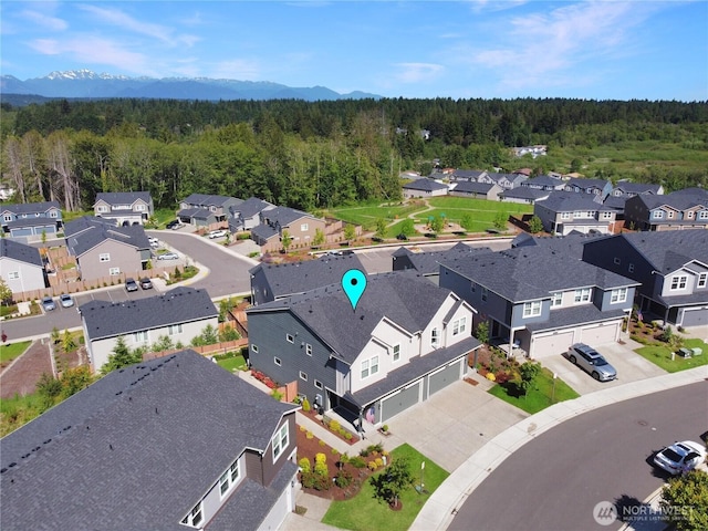 6451 Randolph Dr NE, Bremerton, WA 98311 - aerial view of residential area with a forest and a mountain backdrop