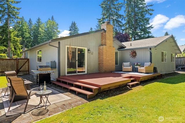 11726 130th Avenue Ct E, Puyallup, WA 98374 - back of property with a chimney, a patio area, and a deck