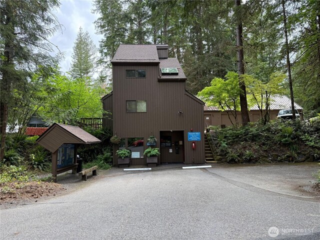 10500 Mt Baker Hwy Unit 1003, Glacier, WA 98244 - view of front of house featuring uncovered parking and roof with shingles