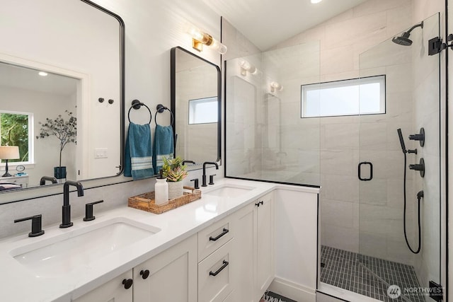 6707 117th Ave NE, Kirkland, WA 98033 - full bathroom featuring a stall shower, double vanity, plenty of natural light, vaulted ceiling, and recessed lighting