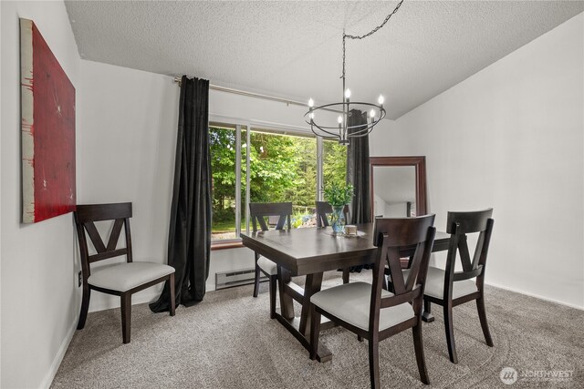 37911 300th Ave SE, Enumclaw, WA 98022 - dining room with baseboard heating, a chandelier, carpet floors, a textured ceiling, and baseboards