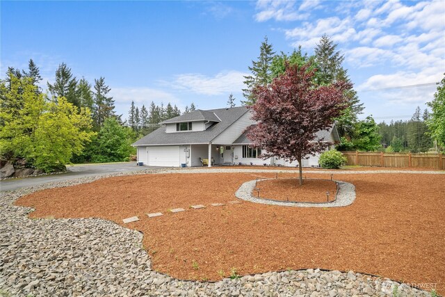 37911 300th Ave SE, Enumclaw, WA 98022 - view of front of house with driveway, a garage, and a shingled roof