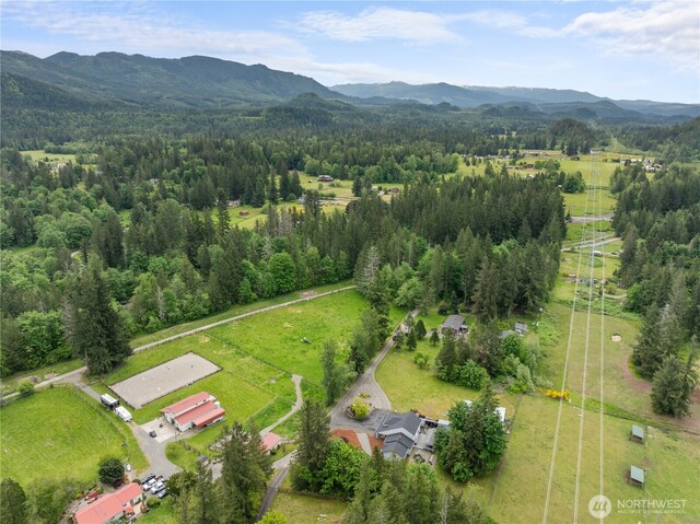 37911 300th Ave SE, Enumclaw, WA 98022 - drone / aerial view of a mountainous background and a heavily wooded area