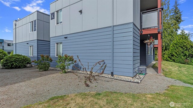 323 128th St SE Unit K120, Everett, WA 98208 - view of side of home featuring board and batten siding