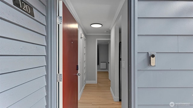 323 128th St SE Unit K120, Everett, WA 98208 - hallway with crown molding, baseboards, and light wood-style floors