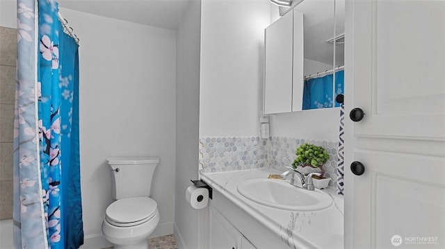 323 128th St SE Unit K120, Everett, WA 98208 - bathroom with vanity, toilet, a shower with shower curtain, and baseboards