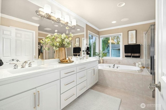 23510 14th Dr SE, Bothell, WA 98021 - bathroom with tile patterned flooring, double vanity, a garden tub, ornamental molding, and a shower stall