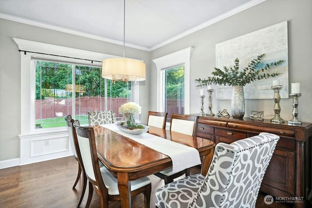 23510 14th Dr SE, Bothell, WA 98021 - dining area with ornamental molding, dark wood finished floors, and baseboards