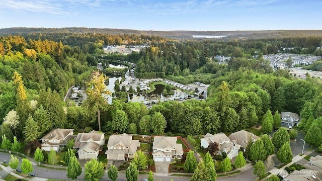 23510 14th Dr SE, Bothell, WA 98021 - aerial overview of property's location featuring a heavily wooded area and nearby suburban area