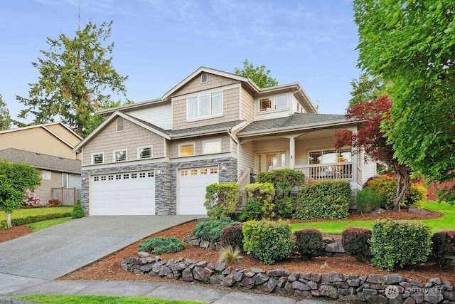 23510 14th Dr SE, Bothell, WA 98021 - craftsman house with an attached garage, stone siding, driveway, and a porch