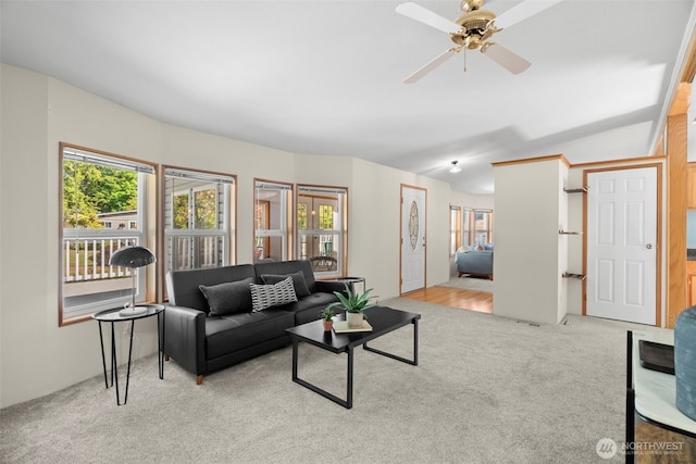 3758 Aiken Rd SE, Port Orchard, WA 98366 - living room featuring carpet flooring, plenty of natural light, a ceiling fan, and vaulted ceiling