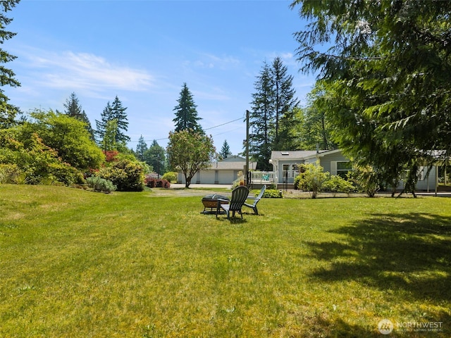 3758 Aiken Rd SE, Port Orchard, WA 98366 - view of green lawn with a wooden deck