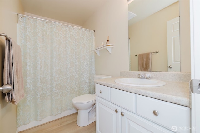 2760 SW Jabirin Way, Port Orchard, WA 98367 - full bathroom featuring vanity, toilet, wood finished floors, and a shower with shower curtain