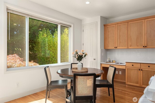 27332 SE 10th Ct, Sammamish, WA 98075 - dining space with light wood-type flooring, recessed lighting, and baseboards