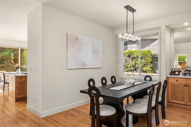 27332 SE 10th Ct, Sammamish, WA 98075 - dining space with light wood-style flooring, baseboards, a chandelier, and recessed lighting