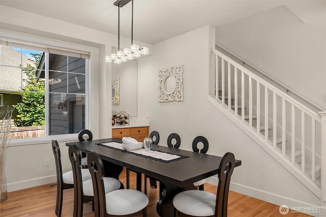 27332 SE 10th Ct, Sammamish, WA 98075 - dining room featuring baseboards, stairway, and light wood finished floors