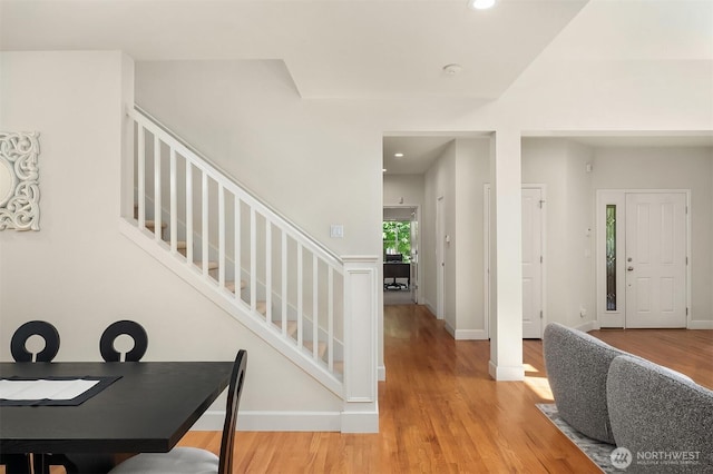 27332 SE 10th Ct, Sammamish, WA 98075 - dining area featuring stairs, light wood-style floors, recessed lighting, and baseboards