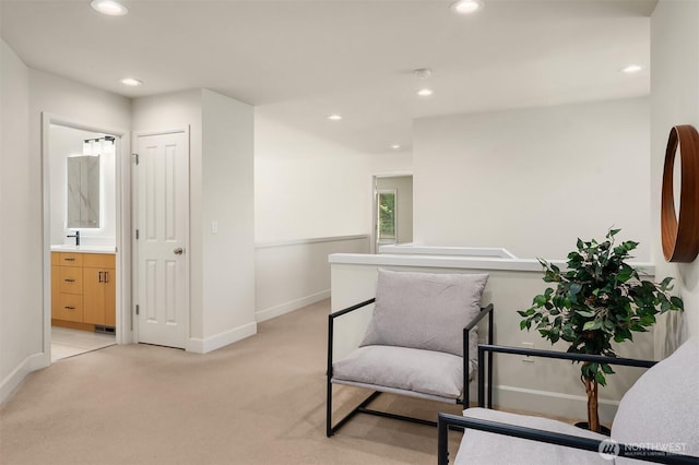 27332 SE 10th Ct, Sammamish, WA 98075 - sitting room with light carpet, recessed lighting, and baseboards